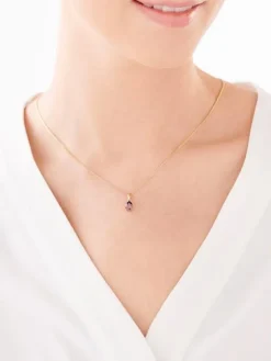 Złota zawieszka z granatem syntetycznym