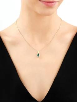 Złota zawieszka z korundem syntetycznym