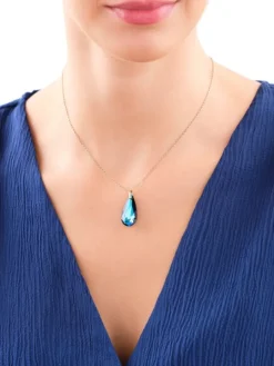 Złota zawieszka z kryształem syntetycznym