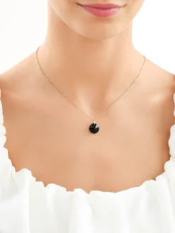 Złota zawieszka z kryształem syntetycznym