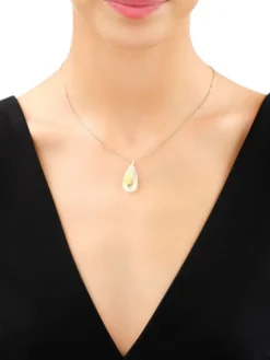 Złota zawieszka z kryształem syntetycznym