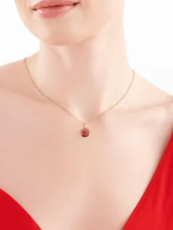 Złota zawieszka z kryształem syntetycznym