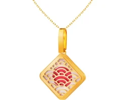 Złota zawieszka z masą perłową i emalią