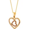 Złota zawieszka z rubinami syntetycznymi  i cyrkoniami - serca