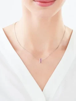 Złota zawieszka z rubinami syntetycznymi i cyrkoniami