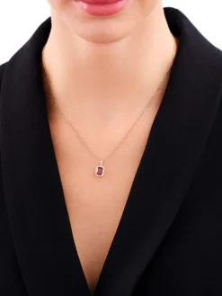 Złota zawieszka z rubinem syntetycznym i cyrkoniami