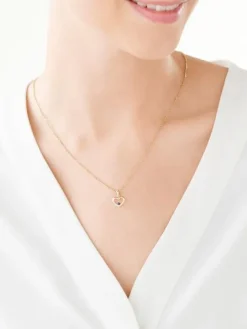 Złota zawieszka z szafirem syntetycznym  - serce