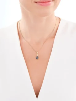 Złota zawieszka z topazem syntetycznym  i cyrkonią