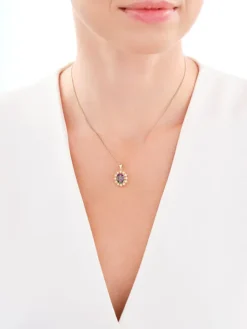 Złota zawieszka z topazem syntetycznym i cyrkoniami