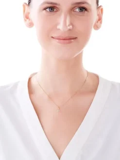 Złota zawieszka z turkusem syntetycznym - oko