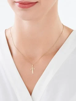 Złota zawieszka z wizerunkiem Chrystusa - krzyż