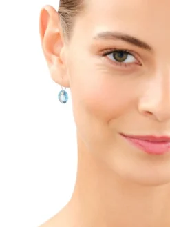 Złote kolczyki z kryształami syntetycznymi