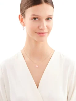 Złote kolczyki z kryształami syntetycznymi