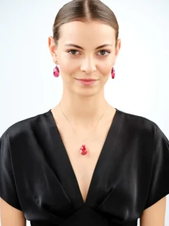 Złote kolczyki z kryształami syntetycznymi