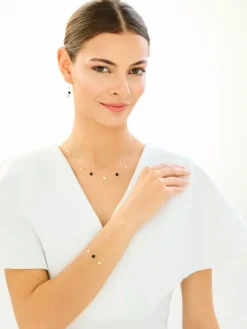 Złote kolczyki z onyksami syntetycznymi