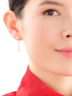 Złote kolczyki z perłami