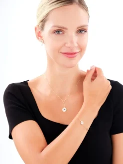 Złoty naszyjnik z emalią i masą perłową - kwiat