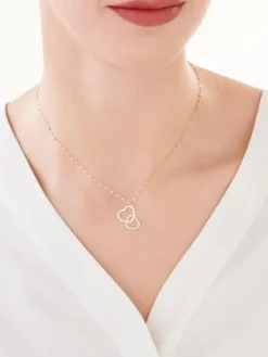 Złoty naszyjnik z emalią, skręcone blaszki - serca