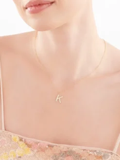 Złoty naszyjnik z masą perłową, ankier - litera K