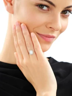 Złoty pierścionek z opalitem i cyrkoniami